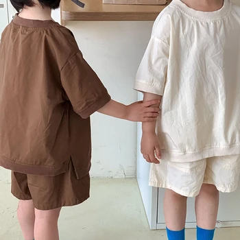 Летняя детская одежда, хлопковая однотонная футболка с коротким рукавом + шорты, комплект одежды для маленьких девочек и мальчиков в корейском стиле Изображение